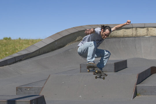 Skateboarder In Mid Air Action