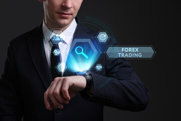 Business, Technology, Internet and network concept. Young businessman working on a virtual screen of the future and sees the inscription: Forex trading