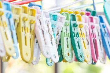 Clothes pegs colorful on the washing line.