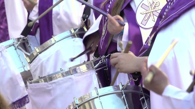 Close-up of hands playing drums