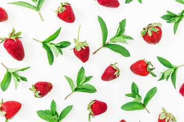 Juicy fresh strawberries on white background. Flat lay. Top view.