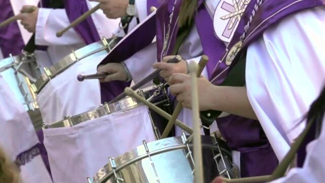 Close-up of hands playing drums