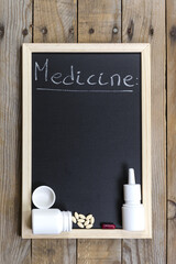 Space chalkboard background texture with wooden frame for medicine, pills. blackboard space for...