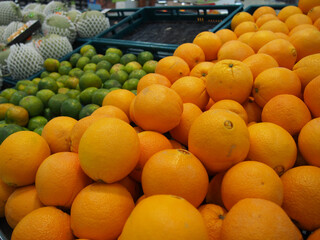 a pile of fruits in open air fruits market