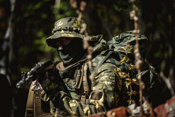 Military men with submachine gun