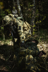 The soldier saves his comrade in battle