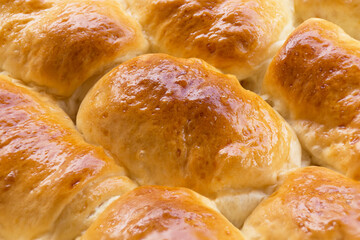 Several pieces of bread that finished just out of the oven. Color beautiful appetizing.