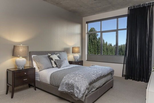 Comfortable modern bedroom with view window.