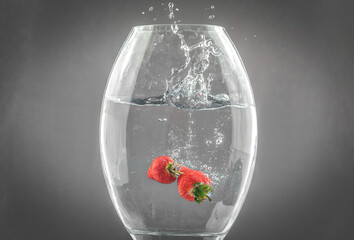 Strawberries Falling Into water