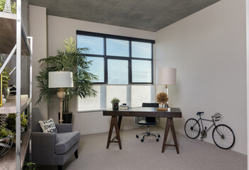 Modern home office room with wooden desk