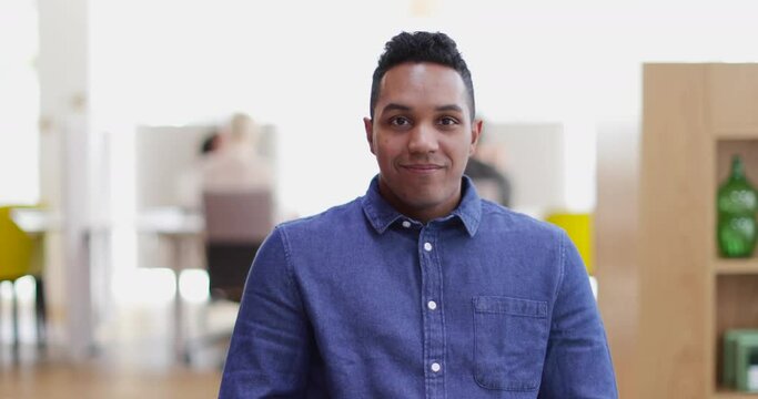 Portrait of male entrepreneur in a modern shared workplace