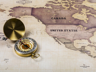 Fototapeta na wymiar Compass with world map