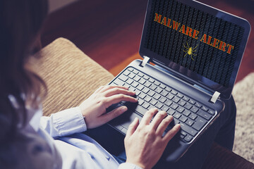 Malware alert in a laptop computer.