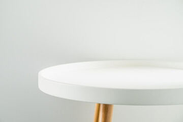 Empty modern round white table top at white house wall,Mock up space for display or montage of...
