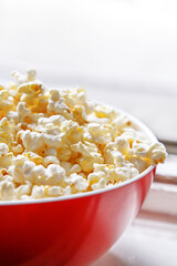 Popcorn bowl with copy space. Lifestyle image.