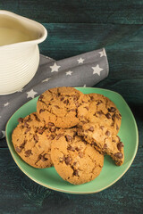 Chocolate chips cookies with jar of milk and copyspace