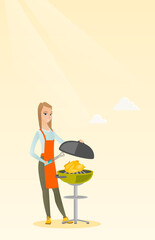 Woman cooking chicken on barbecue grill.