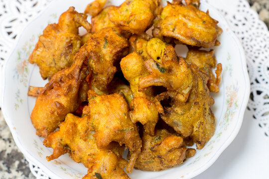 Crispy onion pakora or bhajis or pakoda, popular fried Indian snack for Ramadan iftar