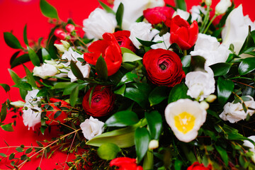 Fototapeta na wymiar Gorgeous bouquet of ranunculus and anemon and tulip