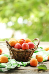 Ripe apricots fruit on grey wooden table