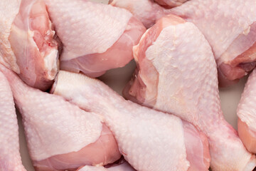 Fototapeta premium Fresh chicken leg, meat on plate.With spices.