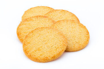 Stacked short pastry cookies isolated on white background.