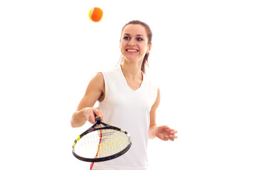 Woman playing with tennis racquet