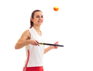 Woman playing with tennis racquet