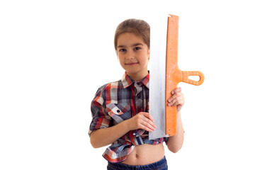 Little girl holding putty knife 