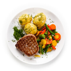 Grilled beefsteak with potatoes on white background