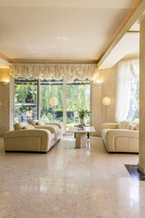 Beige living room in luxurious style