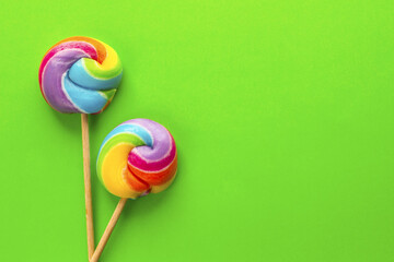 two rainbow colour lollipop