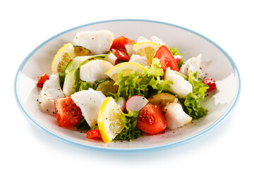 Salad with grilled fish fillet on white background