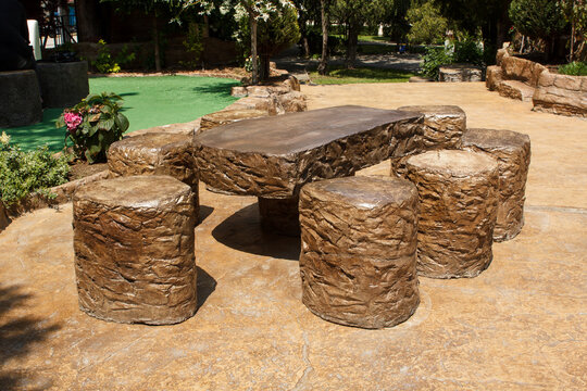Stamped pattern concrete table and stools. Exterior design