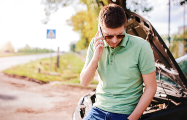 Problem with a car. A broken car on the road