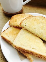 Fototapeta na wymiar Morning breakfast with coffee and white toast 