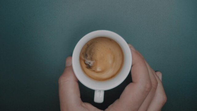 Coffee Mix With One Hand. View From top