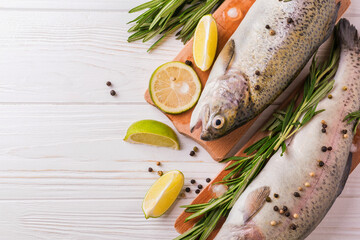 Seafood. Two raw rainbow trouts marinated with lime, rosemary