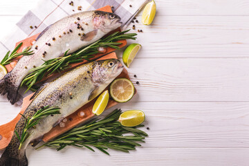 Seafood. Two raw rainbow trouts marinated with lime, rosemary