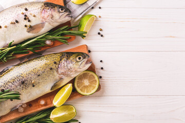 Seafood. Two raw rainbow trouts marinated with lime, rosemary