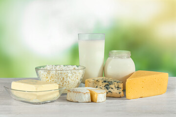 Different dairy products on wooden table