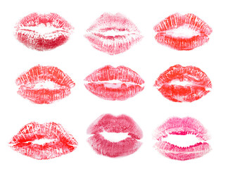 Different lipstick prints of women lips on white background - obrazy, fototapety, plakaty