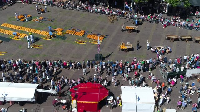 Aerial of Alkmaar city centre near Kaas Markt Alkmaar is well known for its traditional cheese market for tourists it is popular cultural destination showing square with cheeses and cheese walkers 4k
