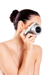 Nude beautiful woman with photo camera.