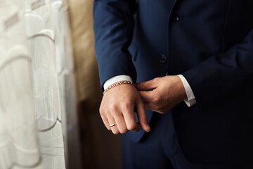 Businessman wears a jacket.Politician, man's style,male hands closeup, American, European businessman, business, fashion and clothing concept