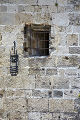 Grill window and lantern of an ancient building, Rhodes island, Greece