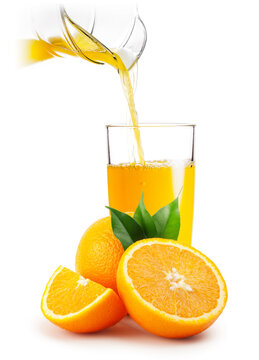 Orange juice pouring into glass and oranges
