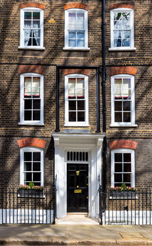 The facade to a traditional town house typical to the district of central London
