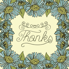 Hand lettering Thanks made on floral background. 
