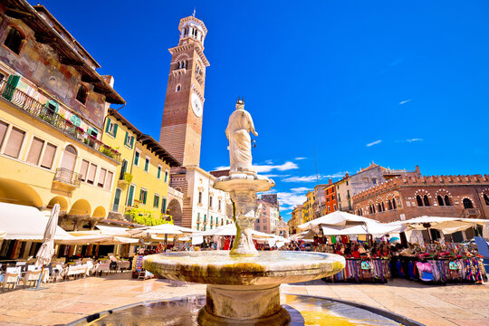 Piazza delle erbe in Verona street and market view